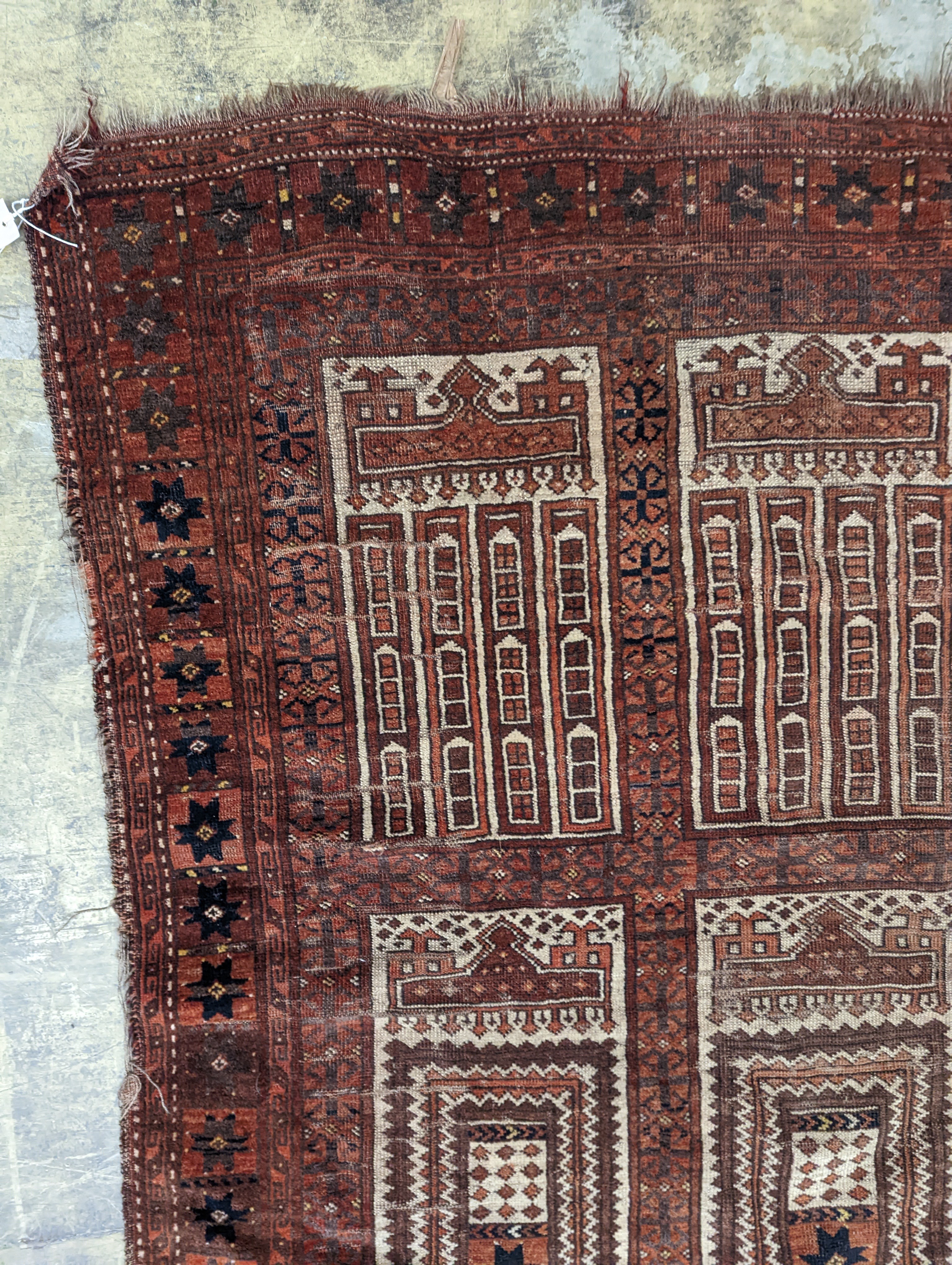 An Afghan red ground prayer rug, 166 x 120cm